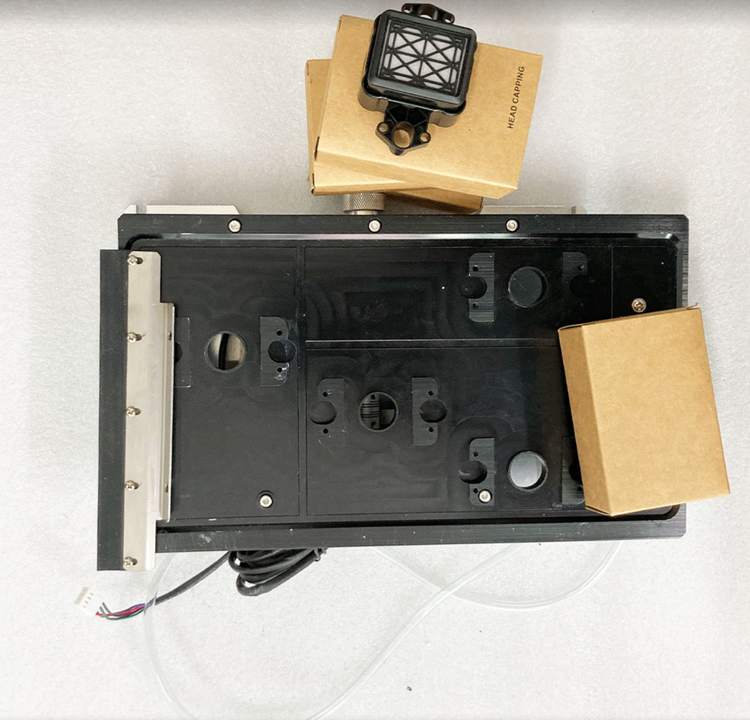 E32 capping station assembly with frame